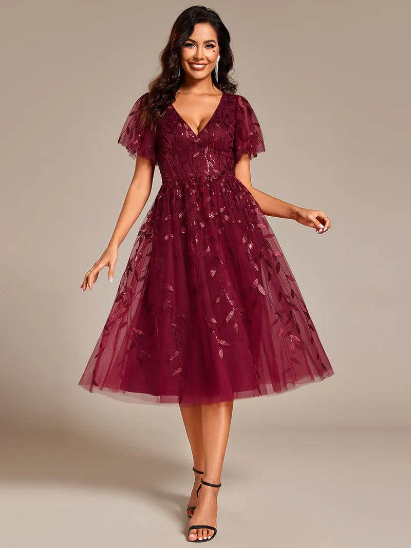 Exquisite Midi-Length Tulle Dress with Ruffled Sleeves, Sequins & Embroidery - Biamonde